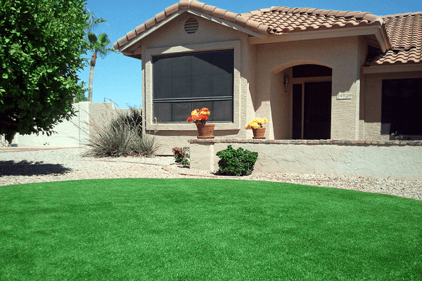 Synthetic turf lawn being installed at a home in Arizona